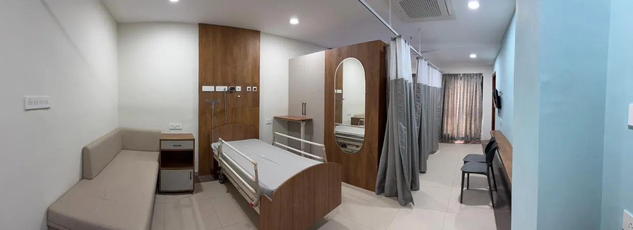 A curtained in-patient bay at Punarv Health