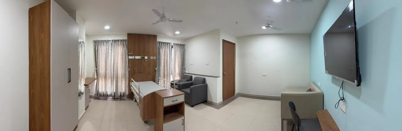 A treatment room with therapy tables